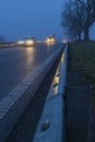 Lighted cars at dusk on  main road Royalty Free Stock Photo