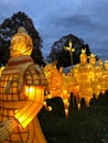 Lighted Chinese soldier army at China Lights show in Hales Corner, Wisconsin with hanging red Chinese lanterns