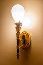 Lighted classic sconce on wall