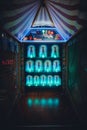 A lighted Down The Clown game in a darkened arcade Royalty Free Stock Photo