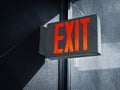 Lighted glowing red emergency exit signs Royalty Free Stock Photo
