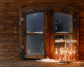 Lighted Red Candles on Stand at Window Pane Royalty Free Stock Photo