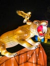 Lighted saber tooth tiger and bird display at China Lights in Hales Corner, Wisconsin