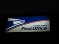 Lighted sign of United States Postal Service in Edison, NJ USA.