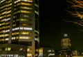 Lighted sky scraper with other illuminated buildings by night, modern dutch city architecture, Utrecht, The Netherlands, 23 Royalty Free Stock Photo