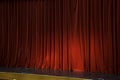 Lighted up red stage curtain Royalty Free Stock Photo