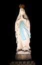 Lighted Virgin Mary in pilgrim town Lourdes Royalty Free Stock Photo
