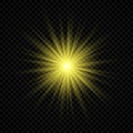 Yellow glowing lights starburst effects with sparkles Royalty Free Stock Photo