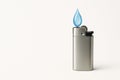 A lighter with a drop of water instead of a flame. Space for text. Royalty Free Stock Photo