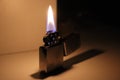 Lighter lit in the dark Royalty Free Stock Photo