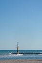 Lighthouse and airplane takeoff Royalty Free Stock Photo