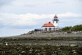 Lighthouse at Alki Point on a cloudy summer day, Seattle, Washington Royalty Free Stock Photo