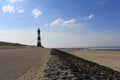 The lighthouse along the beach in breskens, the netherlands in springtime