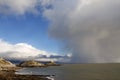 Lighthouse and approaching storm Royalty Free Stock Photo