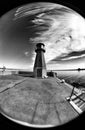 Lighthouse. Artistic look in black and white. Fisheye view.