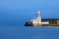 Lighthouse in Balbriggan, Ireland calm water, long exposure blue hour Royalty Free Stock Photo