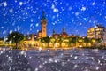 Lighthouse by the Baltic pier in Sopot at night by falling snow