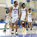 Lighthouse basketball players playing on a field at the competition