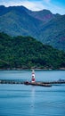 Lighthouse bay, blue lake, Koh Chang Thailand, mountain and water scenery. Royalty Free Stock Photo