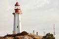 Lighthouse BC West Coast Canada granite rock cliff Royalty Free Stock Photo