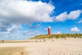 Lighthouse and beach of De Cocksdorp on Texel island, Netherlands Royalty Free Stock Photo