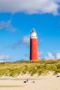 Lighthouse and beach of De Cocksdorp on Texel island, Netherlands Royalty Free Stock Photo
