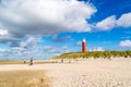 Lighthouse and beach of De Cocksdorp on Texel island, Netherlands Royalty Free Stock Photo