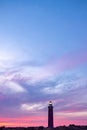 Lighthouse Beacon Against a Twilight Sky