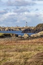 Lighthouse and Beacon of Ouessant, the island of Ushant, in Brittany, french rocky beach in northern France, Finistere Royalty Free Stock Photo