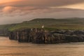 Lighthouse at beautiful Faeroe islands, summer time Royalty Free Stock Photo