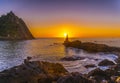 Lighthouse during a beautiful orange sunset in the Pasajes San Juan, Gipuzkoa, Spain Royalty Free Stock Photo