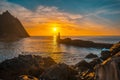 Lighthouse during a beautiful orange sunset in the Pasajes San Juan, Gipuzkoa, Spain Royalty Free Stock Photo