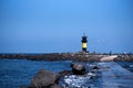 A lighthouse on the blue sea