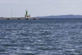 Lighthouse with blue sea