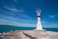 Lighthouse on the blue sky background. Wide angle wiew Royalty Free Stock Photo