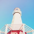 Lighthouse with blue sky, retro effect