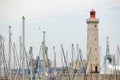 Lighthouse and boat mast Royalty Free Stock Photo