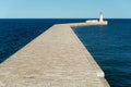 Lighthouse at entrance of the Grand Harbour Malta Royalty Free Stock Photo