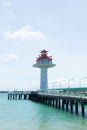 Lighthouse bridge stretching into the sea. Royalty Free Stock Photo
