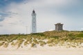 Lighthouse and bunker in the sand dunes on the beach of Blavand, Jutland Denmark Europe Royalty Free Stock Photo
