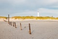 Lighthouse and bunker in the sand dunes on the beach of Blavand, Jutland Denmark Europe