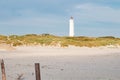 Lighthouse and bunker in the sand dunes on the beach of Blavand, Jutland Denmark Europe Royalty Free Stock Photo