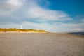 Lighthouse and bunker in the sand dunes on the beach of Blavand, Jutland Denmark Europe Royalty Free Stock Photo