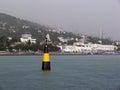 Lighthouse buoy at sea Royalty Free Stock Photo