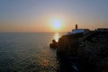 Lighthouse Cabo Vicente in Sagres Portugal at sunset