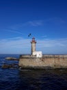 lighthouse in the with the calm sea Royalty Free Stock Photo