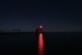 Sturgeon bay pierhead canal lighthouse door county wisconsin red beacon illuminated on a clear night