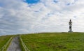 Lighthouse and cape of Ajo, in the autonomous community of Cantabria Royalty Free Stock Photo