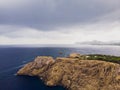 Lighthouse at Cape Formentor in Coast of North Mallorca, Spain. Artistic sunrise and dusk landascape Royalty Free Stock Photo