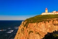 Lighthouse on the cliff at Cabo da Roca. Cabo da Roca or Cape Roca is westernmost cape of mainland Portugal, continental Europe